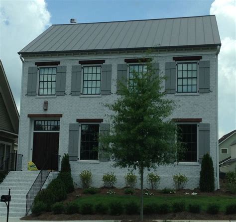 painted brick houses | Painted brick... Grey shutters ...