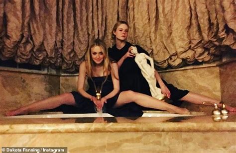 Dakota And Elle Fanning Are Stylish In Black Frocks As They Ring In The New Year With Champagne