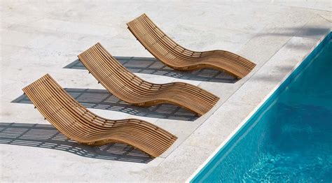 This is one of the best beach lounge chairs for beach lovers. Modern-Teak-Poolside-Chaise-Lounge-Low-Curved-Outdoor ...
