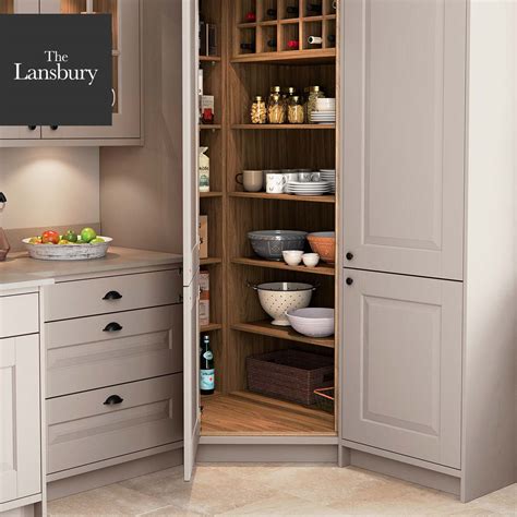 Elevate your space with practical storage solutions, ﻿perfect for a busy kitchen. Corner Kitchen Pantry | The Lansbury by Masterclass Kitchens