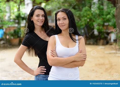 Portrait Of Two Happy Beautiful Women Together Outdoors Stock Photo