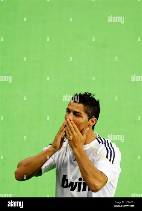 Real Madrids New Portuguese Soccer Player Cristiano Ronaldo Blows A