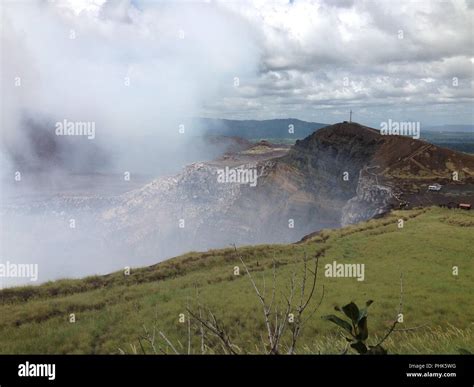 Smoking Masaya Volcano Crater And Cross At Masaya National Park