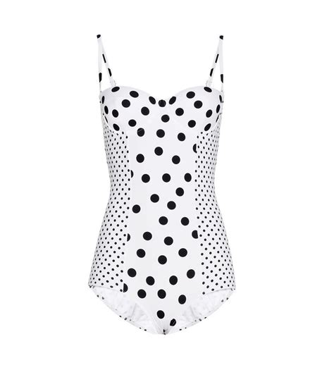 dolce and gabbana polka dot swimsuit strategically placed panels of print give this dolce