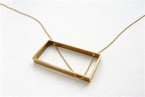 This video is a display of our gold plated sterling silver genuine vermeil 2.5 by 7mm rectangle box chain necklace, bracelet and anklet. Rectangle Necklace | Rectangle necklace, Geometric brass ...