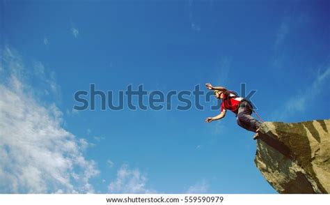 Jump Off Cliff Into Canyon Rope Stock Photo 559590979 Shutterstock