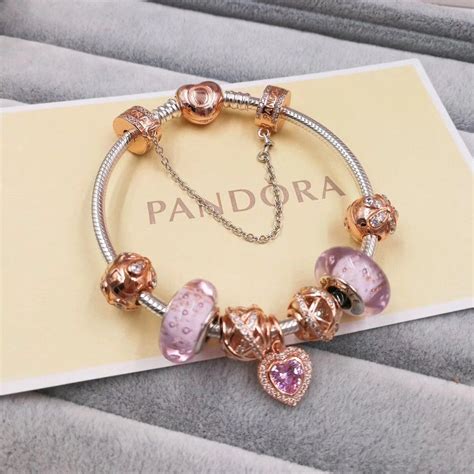 Pandora Charm Bracelet With 7 Pcs Pink Gold Charms Gold Clasp Head