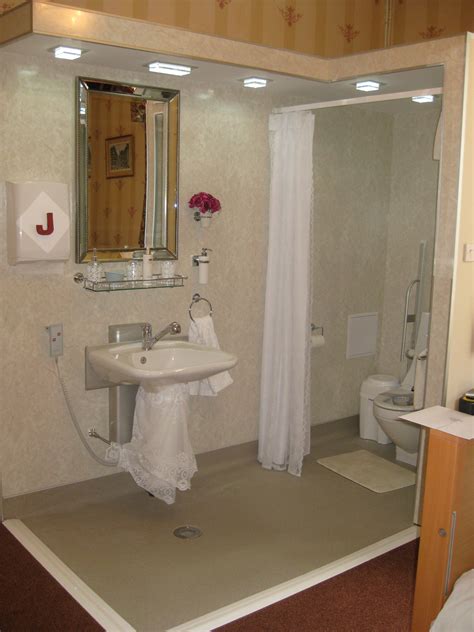 By teaming products designed for safe bathing. The best Disabled Bathroom Design