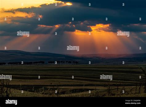 Dramatic Sunset Over Farm Fields Stock Photo Alamy