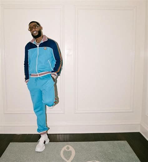 Gucci Mane Wearing A Gucci Neon Blue Tracksuit With Sunglasses
