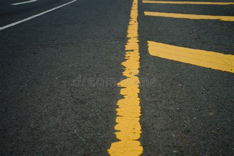 Road Traffic Paint Yellow On The Asphalt Surface Stock Image Image Of