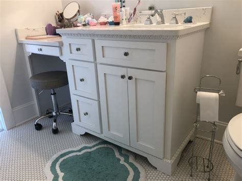 Sounds and smells from neighboring apartments leak as well. Bathroom | Rudisill Cabinet Shop