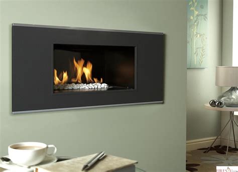 hole in the wall gas fires with pebbles - Google Search | Wall gas fires, Gas fires, Wall fires