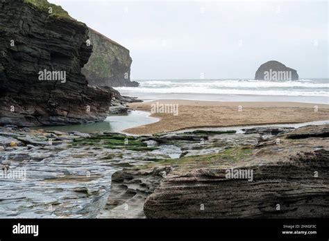 Trebarwith Strand Beach In Winter With Gull Rock Island Cliffs And