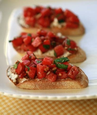 Spread with goat's cheese and top with halved cherry tomatoes and fresh basil. Tomato, Basil and Goat Cheese Bruschetta | Tasty Kitchen ...