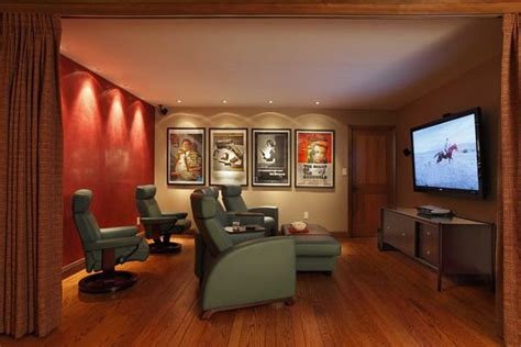 A home theater makes watching your favorite movies and television shows feel like an escape from but a screening room doesn't have to feel like a dark cave—the ones in the homes featured here, from photo: Home Theater Decor: 10 Film Posters That Won't Look Tacky