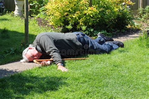 Dead Or Unconscious Elderly Man Lying Down Stock Photo Image 32330152