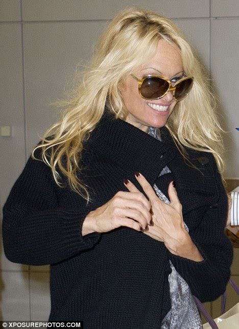 Dancing With The Stars Reject Pamela Anderson Flashes A Smile As She