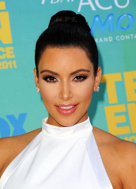 Kim Kardashian Black Bun Updo Hairstyle For Long Hair