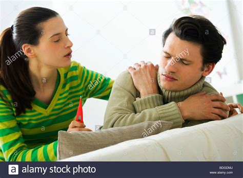 MAN WITH FEVER Stock Photo - Alamy