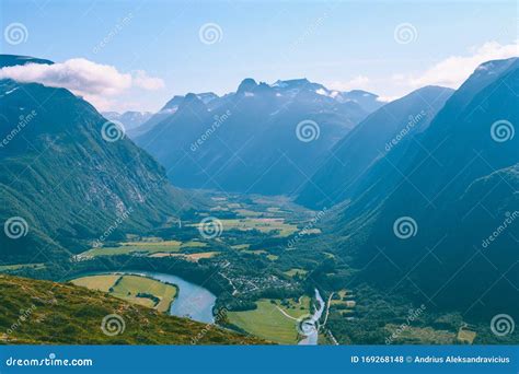 Hiking On The Ridge Of Romsdalseggen In Norway Stock Photo Image Of