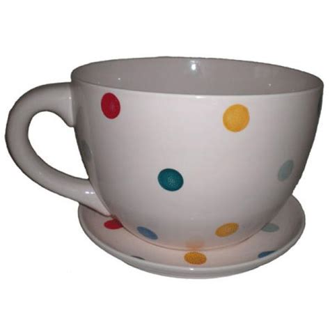 All cups and saucers provide: Giant Cream with Multi Coloured Spots Tea Cup and Saucer ...