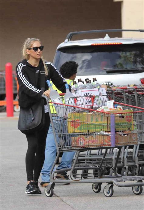 Anna Kournikova In A Black Adidas Hoody Goes Liquor Shopping In Miami