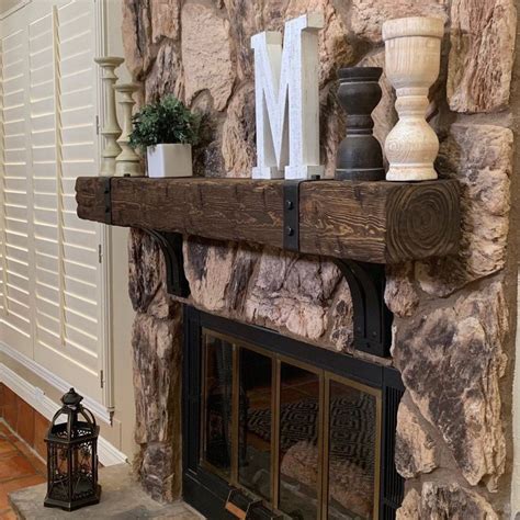 Antique woodworks crafts rustic fireplace mantels from reclaimed wood barn beams, original settler log cabin logs, and other interesting pieces of old wood. Rustic Fireplace Mantel with metal straps & bolts, Custom ...