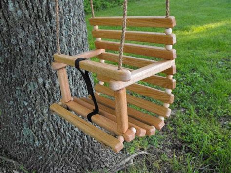 A tree swing is a great way to get your child outdoors playing and swinging and it doesn't cost as nearly as much as a full swing set would. Rope tree swing handcrafted oak for child / by Quarrydesigns, $46.00 | Kids | Pinterest | Wooden ...