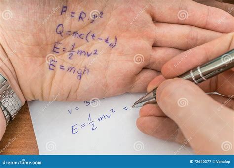 Student Is Cheating During Exam With Cheat Sheet With Formula Stock