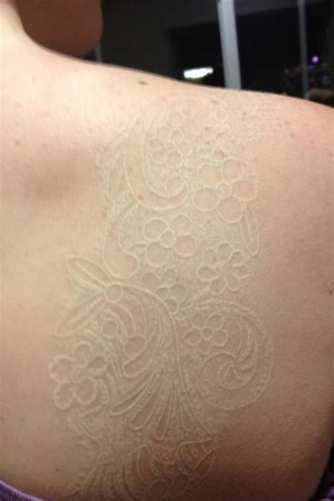 White Ink Tattoos On Pale Skin
