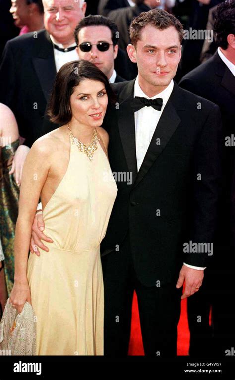 Oscar Nominee Actor Jude Law With His Wife Sadie Frost Arrive For The 72nd Annual Academy