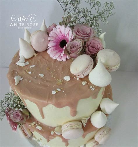 white rose cake design two tier blush pink drippy cake