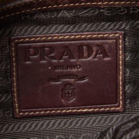 Our moderators have analyzed the digital content of this listing to determine aspects of authenticity. Vintage Authentic Prada Brown Canapa Hobo Bag Italy w Authenticity Card MEDIUM For Sale at 1stdibs