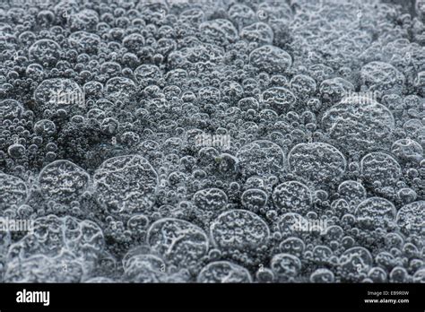 Frozen Air Bubbles In White Ice Stock Photo Alamy