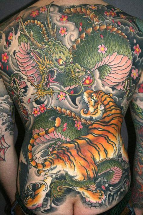 30 Best Tiger And Dragon Tattoo Designs Ideas Dragon Tattoo Dragon Tattoo Designs Tattoo Designs