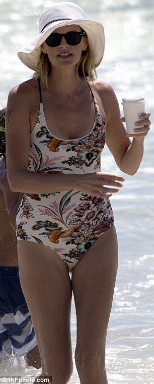 Sarah Murdoch Stuns As She Soaks Up The Sun In Stylish Swimsuit And