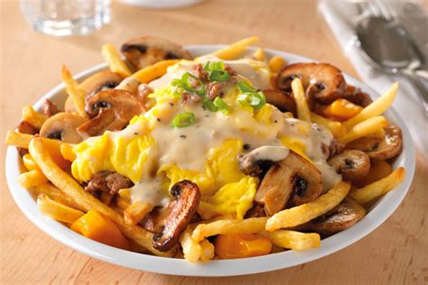 Poutine is a classic quebec dish of crispy french fries, homemade gravy, and squeaky cheese curds. Breakfast Mash Up (Breakfast Poutine) - The Mushroom Council