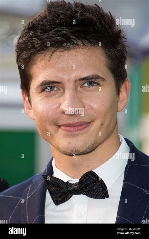 Actor Oleg Ivenko Poses For Photographers Upon Arrival At The Premiere