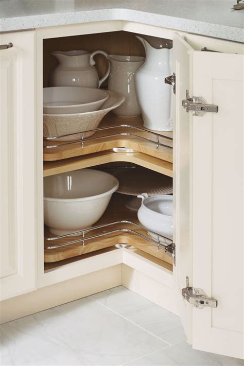 Lazy susan kitchen cabinets are popular fixtures in kitchens, giving extra storage space for small items like canned goods. Base Lazy Susan Cabinet with Chrome Rails - Schrock