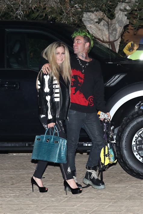 Avril Lavigne Goes Braless In A Sheer Top While Out With Mod Sun