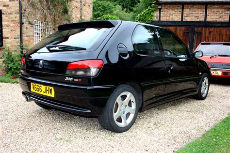 Not only was the 306 a really, really pretty thing, this gti handled very well. Peugeot 306 GTI-6 Back | Marc Sayce | Flickr