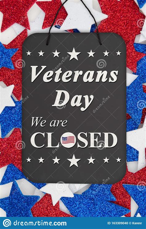 Veterans Day Closed Message On Chalkboard With Red White And Blue