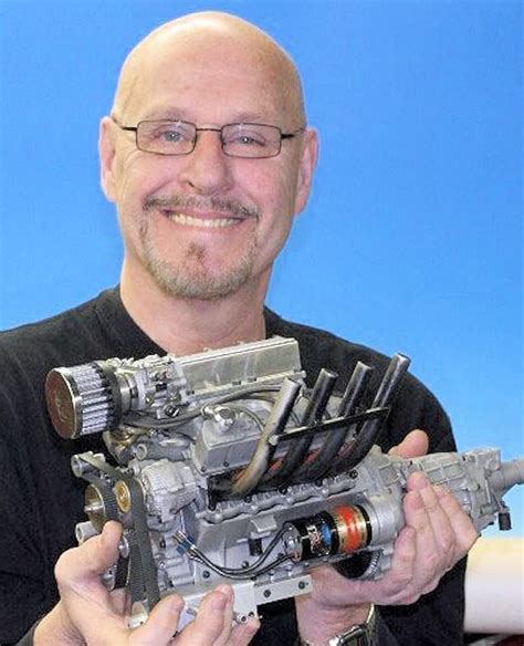 Gary Conley Holding A Production Model Of His New Supercharged V8