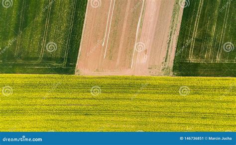 Farmland Aerial Texture Tractor Ploughing Field In Dry Season Royalty