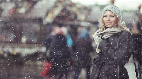Woman Standing Outside In Snow In A City Positive Routines