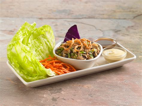 The chicken is is combined with chestnuts and for the salad: Chicken Lettuce Wraps - Sautéed with mushrooms, water chestnuts, celery, green onions a ...