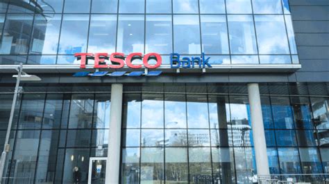 Tesco Tops First Half Profit Forecast Resumes Dividend Payment As