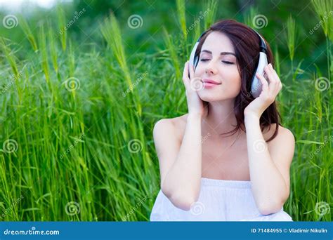 Young Woman With Earphones Stock Image Image Of Sitting 71484955