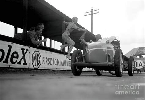 1920s Woman Riding Mechanic Jumping In Race Car At Brooklands